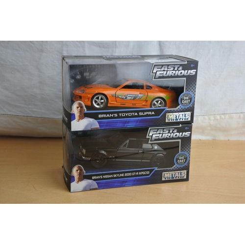 114 - Two boxed Jada 'Fast & Furious' die cast cars - Brian's Toyota Supra and Brian's Nissan Skyline 2000... 