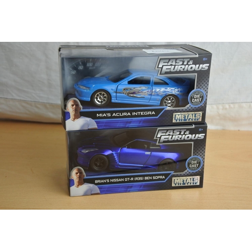 115 - Two boxed Jada 'Fast & Furious' die cast cars - Mia's Acura Integra and Brian's Nissan GT-R (R35) Be... 