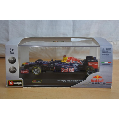 116 - A boxed Burago 'Red Bull Racing' - 2012 Red Bull Racing Team Sebastian Vettel.