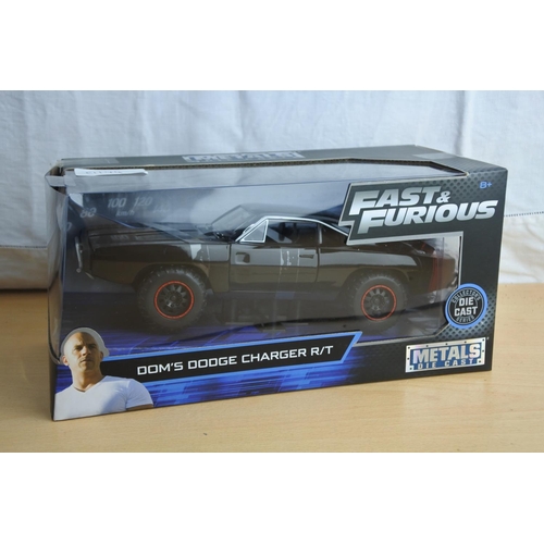 128 - A boxed Jada 'Fast & Furious' die cast car - Dom's Dodge Charger R/T.