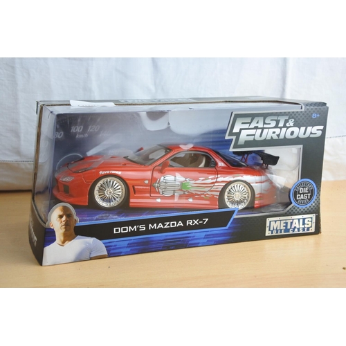 131 - A boxed Jada 'Fast & Furious' die cast car - Dom's Mazda RX7.