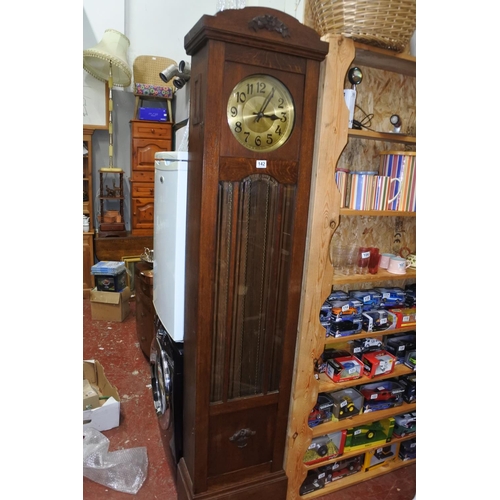 142 - A stunning large antique oak cased grandfather clock. Measuring H-215 W-47cm D-25cm.