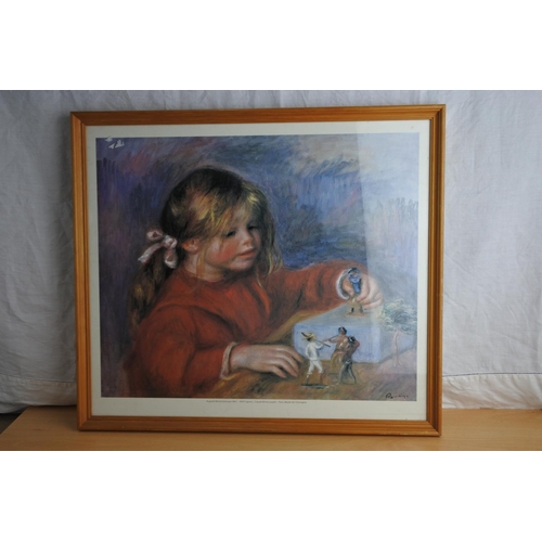 161 - A framed Renoir print.