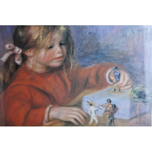 161 - A framed Renoir print.