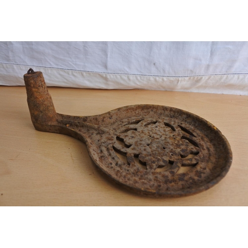 180 - An antique cast iron trivit.