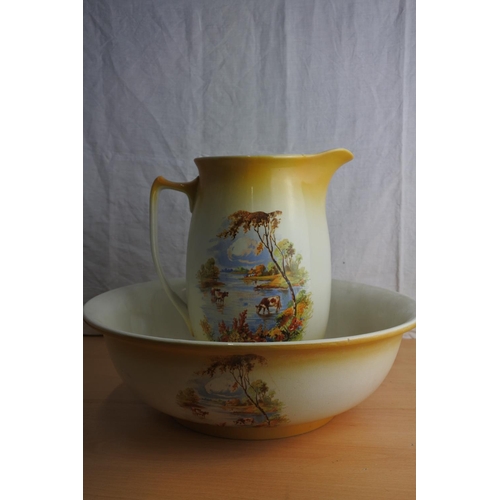 190 - A Victorian jug and basin set with highland cattle design.