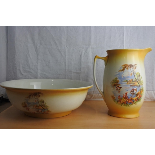 190 - A Victorian jug and basin set with highland cattle design.