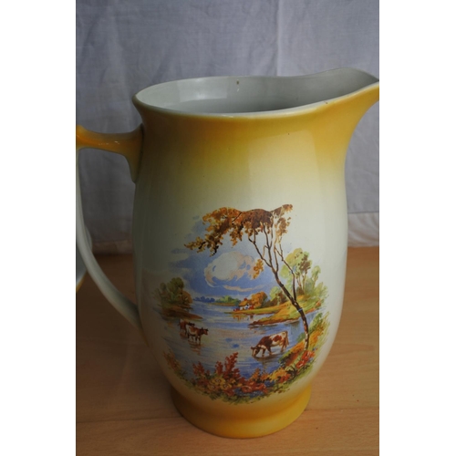 190 - A Victorian jug and basin set with highland cattle design.