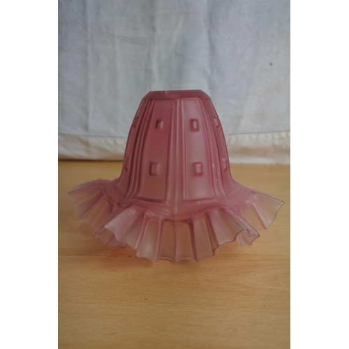 191 - An antique cranberry glass shade.