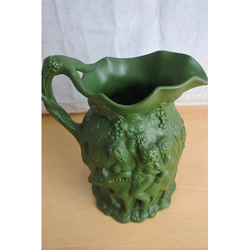 192 - An antique pottery jug 'No 19' stamped on base.