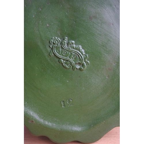 192 - An antique pottery jug 'No 19' stamped on base.