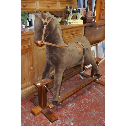 203 - A rocking horse.