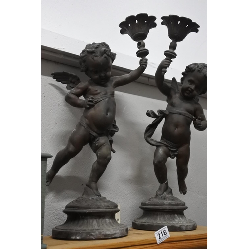 216 - A stunning pair of antique cast metal cherub figures (a/f), measuring H-55cm