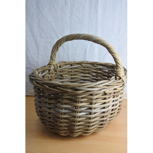 219 - A wicker shopping basket.