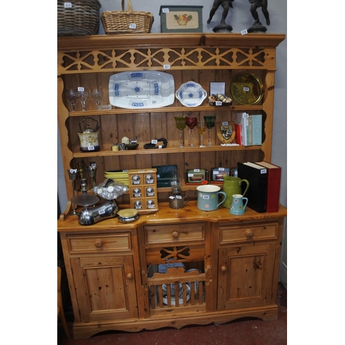 221 - A stunning pine dresser with 'chicken coop' base. Measuring H-200cm W-146cm D-43cm.