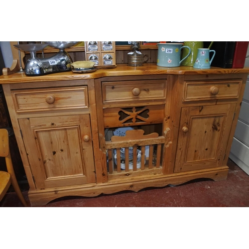 221 - A stunning pine dresser with 'chicken coop' base. Measuring H-200cm W-146cm D-43cm.