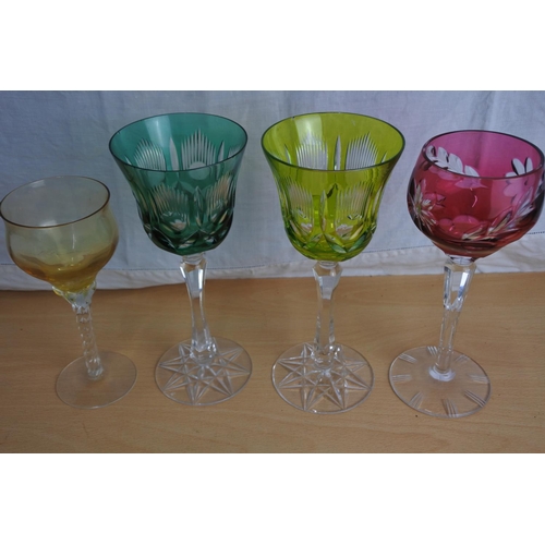 229 - A collection of 4 antique coloured glasses.