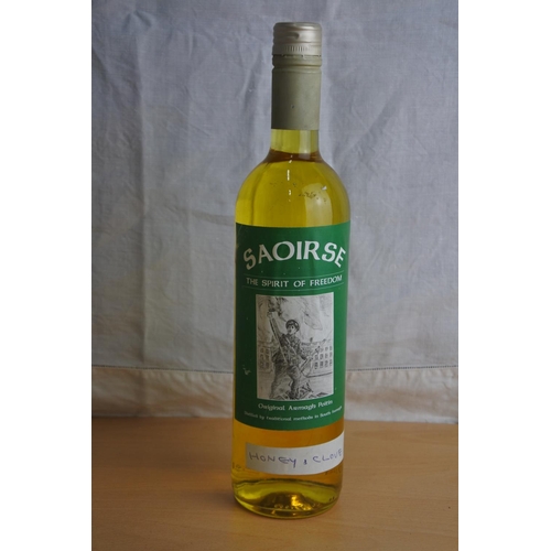 24 - A bottle of Poitin, 'Honey and Clove'.