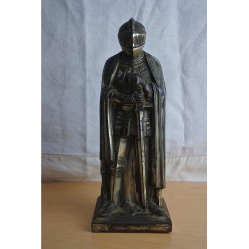 3 - An unusual metal knight lighter measuring 24cm tall.