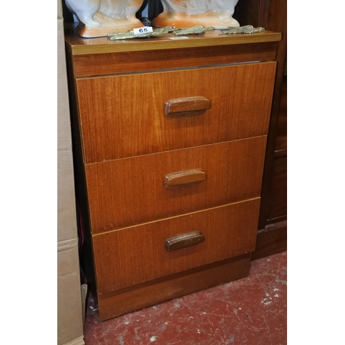 66 - A mid century chest of three drawers.