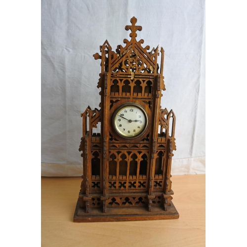 70 - A stunning mahogany carved mantle clock (a/f), measuring 34cm tall.