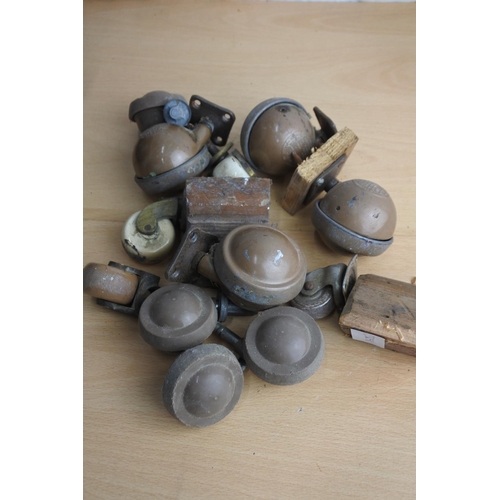 77 - An assortment of furniture castors.