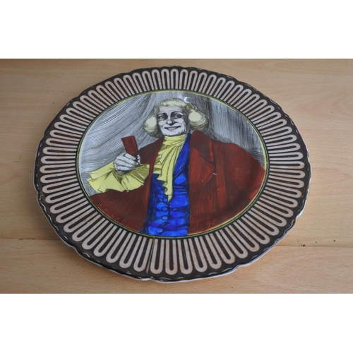 81 - A Royal Doulton plate 'The Squire'.