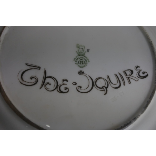 81 - A Royal Doulton plate 'The Squire'.