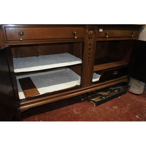 82 - A stunning antique mahogany sideboard with carved detail. Measuring H-100cm W-165cm D-60cm.