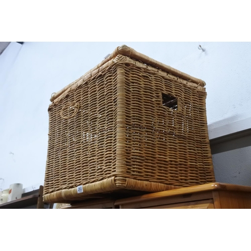 260 - A large wicker storage bin.