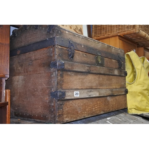 269 - An antique travel trunk.