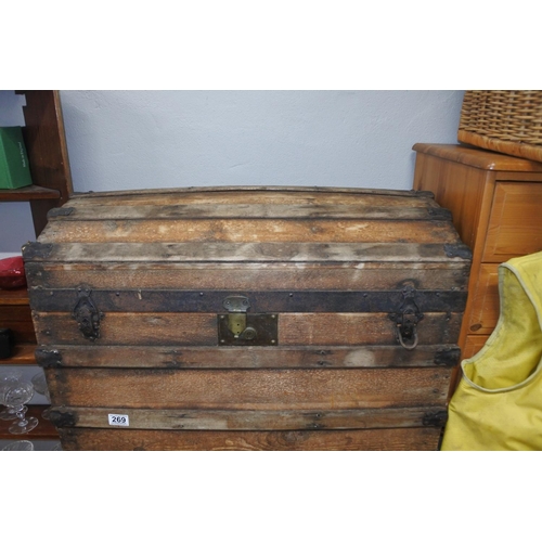 269 - An antique travel trunk.