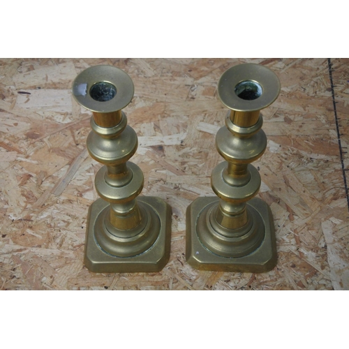 280 - A pair of vintage brass candlesticks.