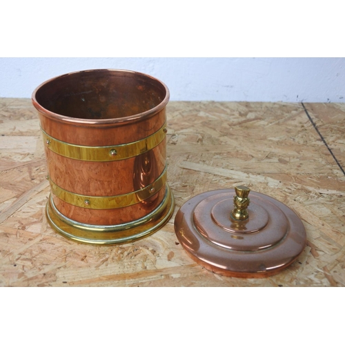 294 - A vintage Linton copper and brass lidded barrel cannister.