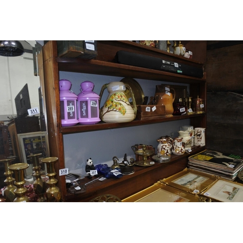 310 - A set of mahogany open bookshelves.