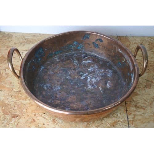 315 - A stunning large antique copper preserving pan. (measures 35cm wide, not including handles).