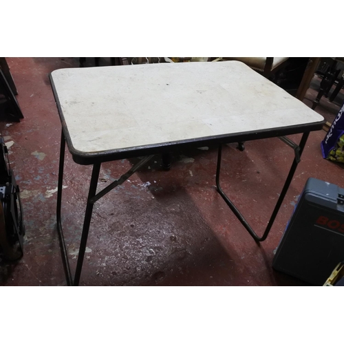 335 - A vintage folding table.