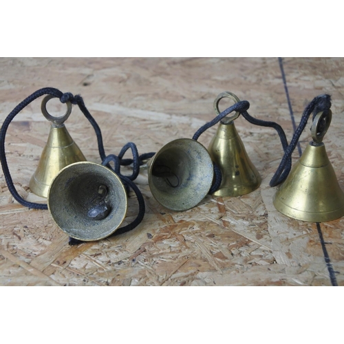 371 - A set of five hanging bells.