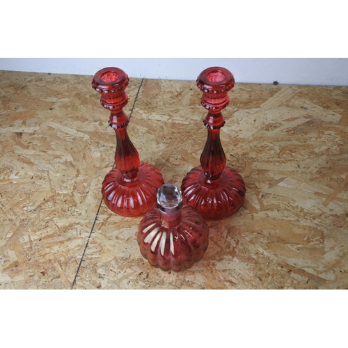 415 - A pair of vintage red glass candlesticks and more.