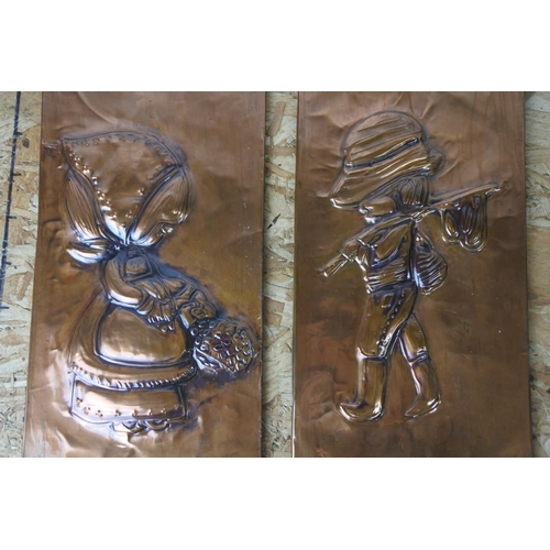 421 - A pair of vintage embossed plaques signed HMcV.