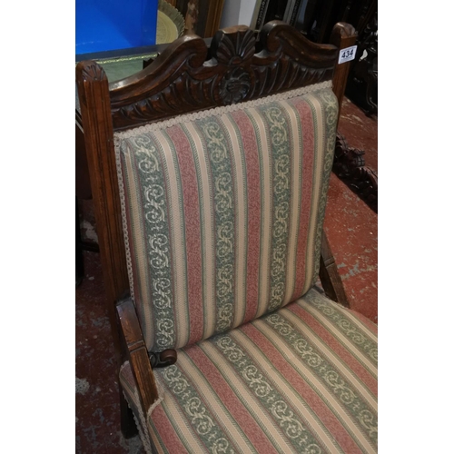 434 - An antique upholstered nursing chair.