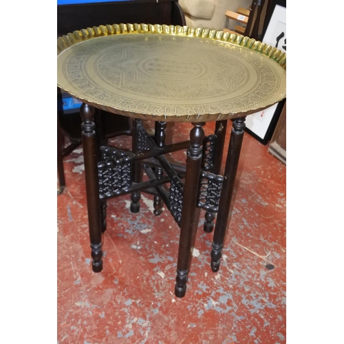 436 - A stunning large antique brass tray on folding base.