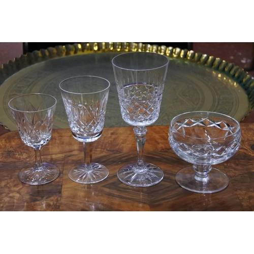 442 - A collection of glass ware to include a set of four Galway crystal glasses, Waterford crystal and mo... 