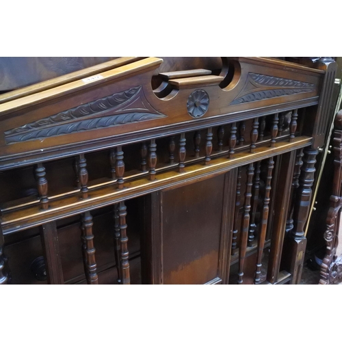 449 - A pair of antique mahogany single bed headboards.