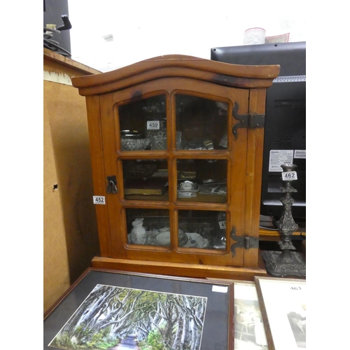 452 - A small wall mounted display cabinet.