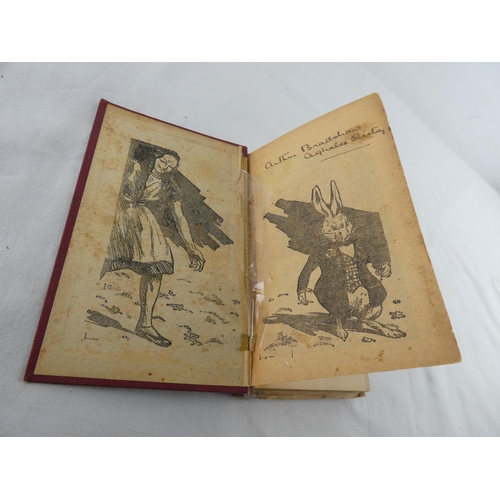 458 - A vintage book 'Alice in Wonderland' by Carroll.