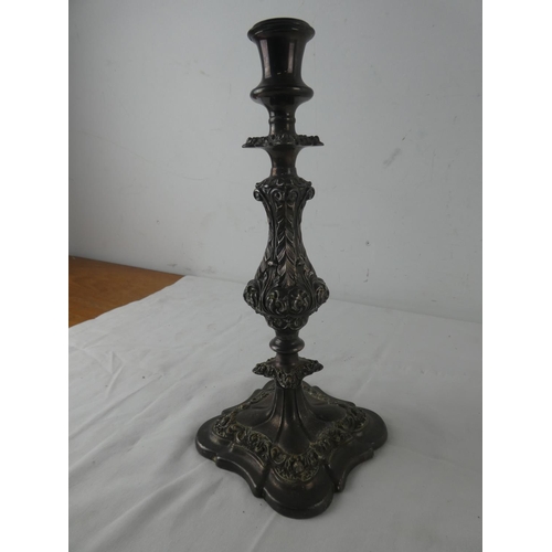 462 - An antique silver plated candlestick.