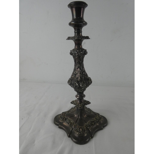 462 - An antique silver plated candlestick.