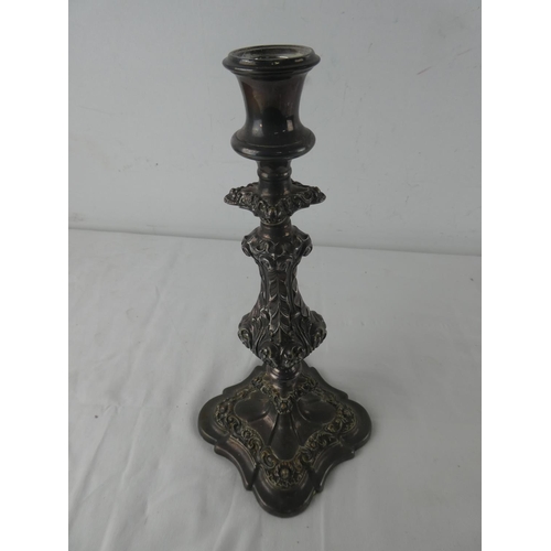 462 - An antique silver plated candlestick.