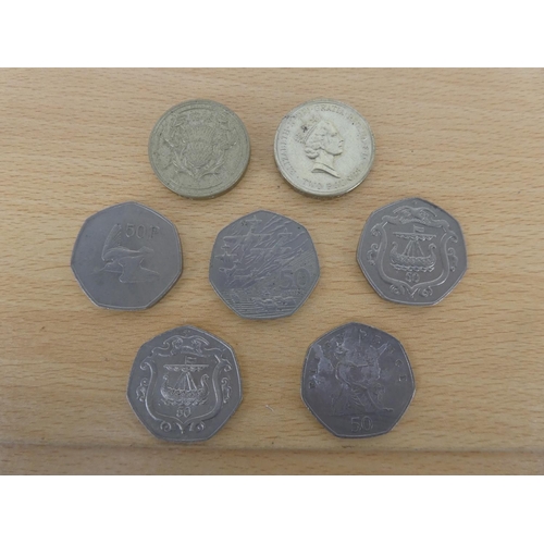 473 - Two £2.00 coins and five 50p coins.